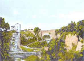 Fotografa antigua coloreada del puente del canal imperial tomada desde aguas abajo del ro Huerva, en la que se puede apreciar la almenara y su escalonado aliviadero.